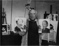 André Gomés Picasso in his studio in the country house Notre Dame de Vie with the portraits of the Rousseaus 1965 © Photo RMN / André Gomes. © Madame Hammoud